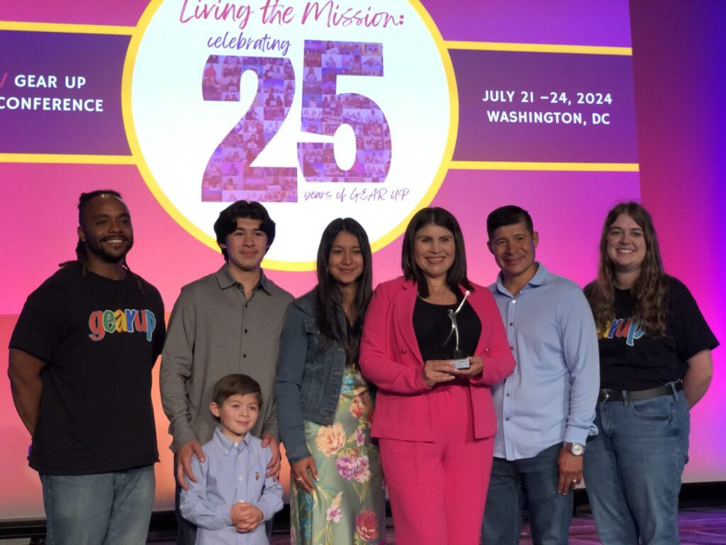 GEAR UP Manchester’s Parent Ambassador, Ana Ascencio, accepting her award as the 2024 Family Leader of the Year at the NCCEP/GEAR UP Annual Conference.