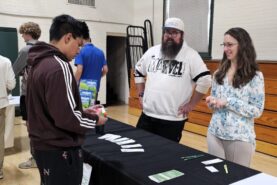 PACE staff tabling at a College Mini Fair.