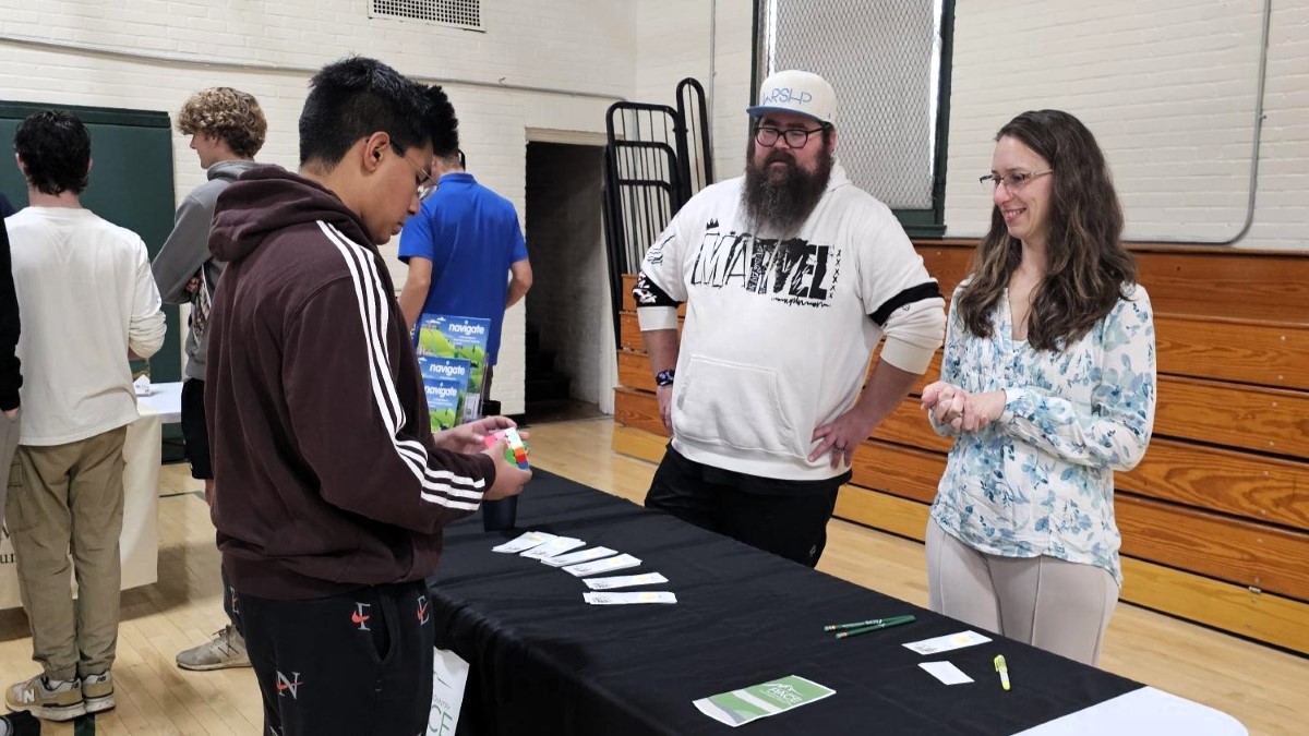 PACE staff tabling at a College Mini Fair.